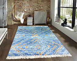 hand knotted silk carpet blue around