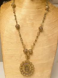 reliquary relika necklace gold filigree