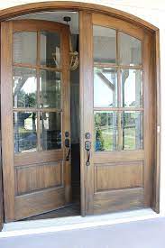Double Wood And Glass Arched Front Door