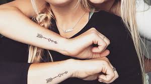 25 matching sister tattoos to celebrate