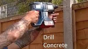drill concrete fence post