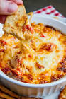baked cheeses with red pepper sauce