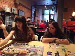 board gaming at cafes and pubs
