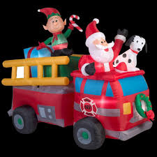 The most common holiday home accent material is cotton. Home Accents Holiday 39466 7 Ft Lighted Inflatable Santa S Fire Truck Scene Vip Outlet