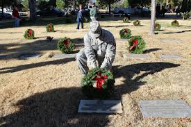 edwards airmen lay wreaths at lancaster