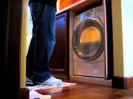 With its already confined space, a small kitchen that houses a washer and dryer can appear even smaller, busier and more cluttered, if you leave the laundry appliances exposed. Hide A Washer Youtube