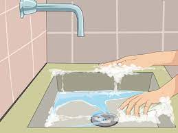 The kitchen sink is still an option, but a baby bathtub will help you safely support a newborn. 3 Ways To Give A Baby A Bath In The Sink Wikihow