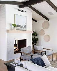 white vaulted ceilings with wood beams