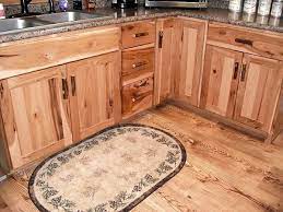 a rustic hickory kitchen with pictures