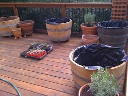 to prepare a half wine barrel planter