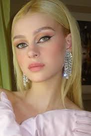 nicola peltz before and after from