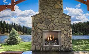 river rock exterior fireplace