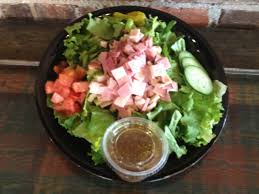 chef salad mixed lettuce tomatoes honey turkey honey ham provolone cheese and cubers served with your choice of dressing 7 29
