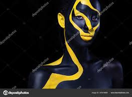 woman with black body paint cheerful