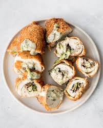 creamy en roulade with spinach and
