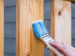 can you paint over varnished wood