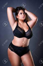 Plus Size Sexy Model In Black Lingerie, Fat Woman On Gray Studio  Background, Overweight Female Body, Long Hair And Make-up Stock Photo,  Picture and Royalty Free Image. Image 108998668.