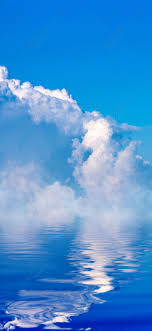 blue sky and white cloud reflection