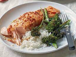 salmon and broccolini share ina