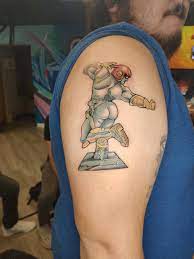 Got a new tattoo yesterday and knew it would fit here! Captain Falcon Bair  Statue : r/smashbros