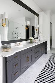 Marble and stone countertop as well as vanity units with sinks, bathroom mirrors and bathroom cupboards and bathroom vanity cabinets in a variety of styles, shapes and sizes. Traditional Black And White Master Bathroom With Double Vanity And Marble Countertops Hgtv