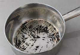 how to remove burnt food from pots