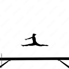 silhouette of gymnast doing the splits