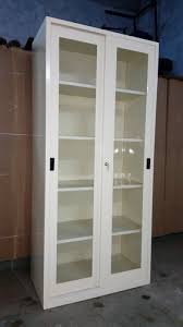 Ivory Sliding Glass Door Cupboard At