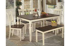 Jeanette dining room set w/ bench by signature design by ashley in dining room sets. Whitesburg Dining Table And 4 Chairs And Bench Ashley Furniture Homestore