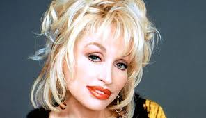 'at close quarters dolly parton is overwhelming.' set design: Dolly Parton Hairstyles 39 Photos For Your Inspiration