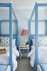 Blue Fabric Wrapped Twin Canopy Beds