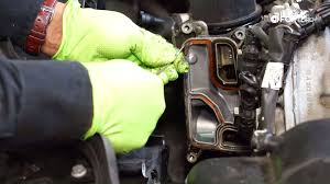 how to replace the oil cooler gasket on