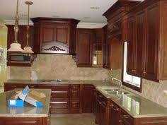 Using a starter or riser molding in conjunction with a crown molding also provides the ability to better disguise an uneven ceiling, as one end of the crown molding may be mounted. 25 Best 45 Kitchen Ideas Dark Cabinets Crown Moldings Dark Cabinets Dark Kitchen Cabinets Kitchen