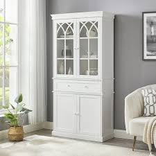 white tall storage cabinet with gl