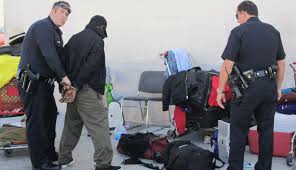 Image result for homelessness cops skid row