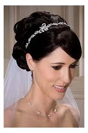 Try this loose twist on the classic pony tail. Wedding Hair With Veil And Tiara Tiara Hairstyles Bride Hairstyles Wedding Hair And Makeup