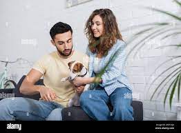 Woman cuddling dog indoors hi-res stock photography and images - Page 8 -  Alamy
