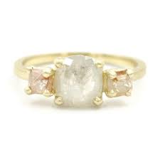 facet three stone opaque diamond ring