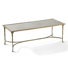 Elegantly veined mirror, bronzed curved base and top. Delano Hollywood Regency Antique Gold Sculpted Leaf Mirrored Rectangular Coffee Table 51 W 60 W Kathy Kuo Home