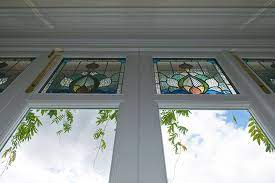 Timber Bifold Doors With Stained Glass