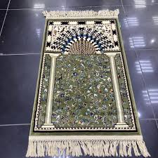 green prayer rug inspired by the carpet