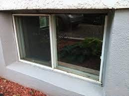 installing basement window in block