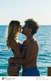 embracing loving couple on beach a