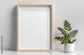 Blank Picture Frame Mockup On Wall In