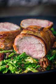 Apple and bacon slaw the is a salad made with red apples, cabbage and bacon coated in a salad dressing of mustard, vinegar, olive oil and honey is a sweet and smoky side dish to serve along with pork tenderloin. Bacon Wrapped Pork Tenderloin With Cabbage And Lentils Krumpli