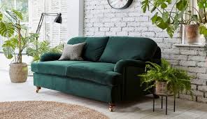 how to decorate with a green sofa