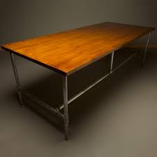 This desk has a wide, rectangular top made from thick engineered wood. Long Plumbing Pipe Desk Base Kit