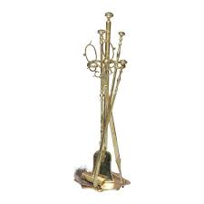 set of bronze and brass fireplace tools