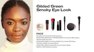 gilded green smokey eye look using