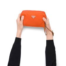 prada fabric cosmetic pouch in orange